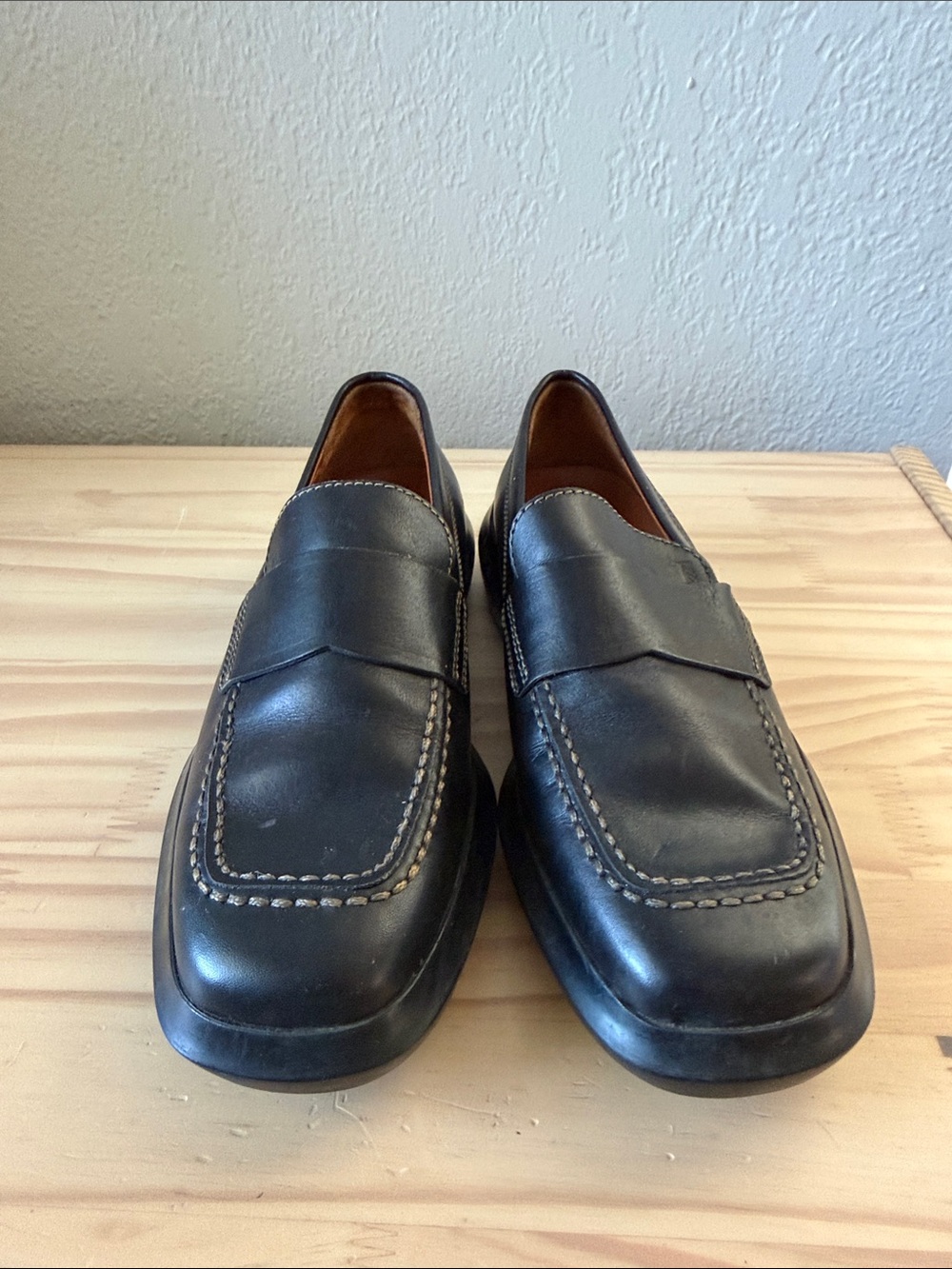 Tod's Black Leather Penny Loafers with Contrast Stitch